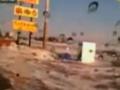 Водитель снял на камеру, как его смыло цунами (ВИДЕО)