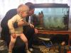 Евгений и Андрюша Бабичи любят наблюдать за своими рыбками. 